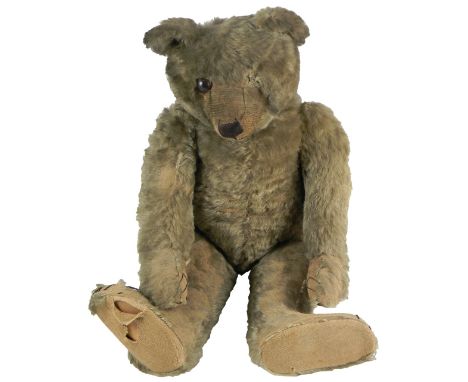 Large J K Farnell Teddy bear, English circa 1920, the straw filled brown mohair bear, with hump to back and clipped muzzle, g