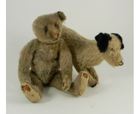 Steiff Teddy bear, German circa 1909, the straw filled brown mohair bear with black button eyes, remains of stitched nose, mo