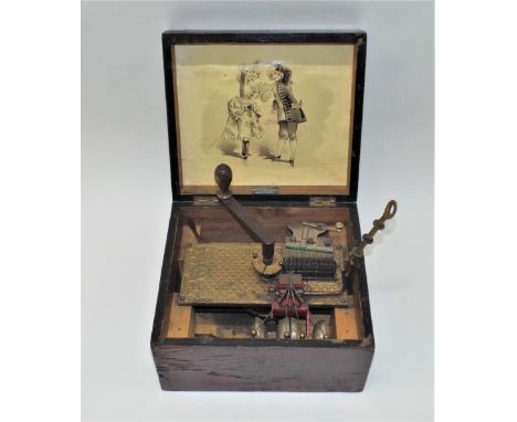 A troubadour 9-inch disc musical box with bell accompaniment,Ser. No. 22667, with single comb, four saucer bells arranged ver