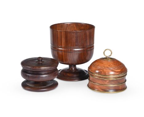Y A LIGNUM VITAE WASSAIL PEDESTAL BOWL 17TH CENTURY 14cm high, the top 21.5cm diameterTOGETHER WITH A LIGNUM PEDESTAL TOBACCO
