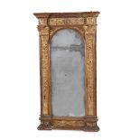 AN ITALIAN CARVED GILTWOOD MIRROR, OF TABERNACLE TYPE, 17TH/18th CENTURY