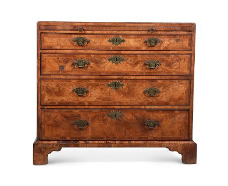 A BURR WALNUT AND FEATHERBANDED CHEST OF DRAWERS IN THE MANNER OF GILES GRENDEY, 18TH CENTURY & LATERWith brushing slide and 