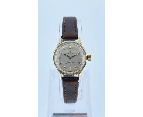 LADIES OMEGA SEAMASTER WRISTWATCH, ref.11074 manual wind 17J cal.620 movement, champagne dial with gilt baton numerals screwd