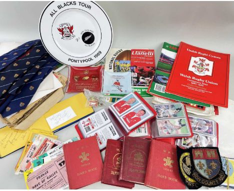 RUGBY UNION EPHEMERA including WRU handbooks, ticket-stubs, circa 1970s posters, pin-badges, Western Mail supplements, cerami