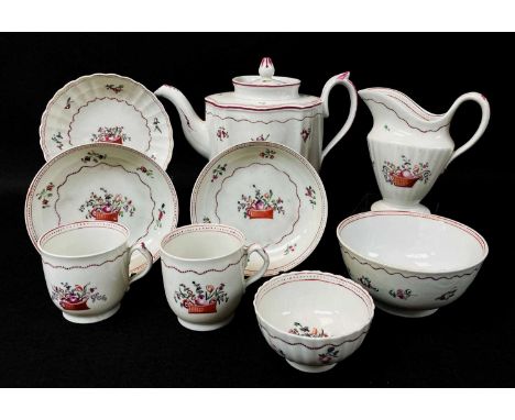 LATE 18TH CENTURY NEWHALL PORCELAIN PART TEA SERVICE, decorated in famille rose style with a basket of flowers and sprigs, co