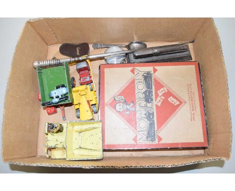 Box containing a quantity of items including Dinky toys in play worn condition, early Monopoly box, travelling example and ot
