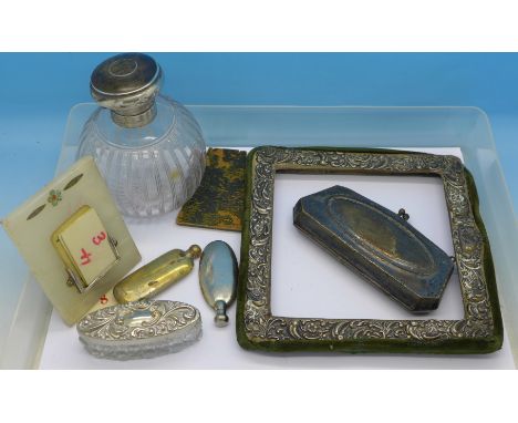 An Ashford marble and silver calendar, picture frame, purse, two scent bottles, a pin dish and a silver and shell bottle