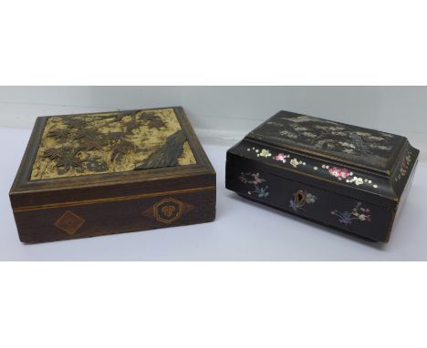 Two Japanese boxes, one ebonised and inlaid with mother of pearl and one with carved Japanese maple leaves