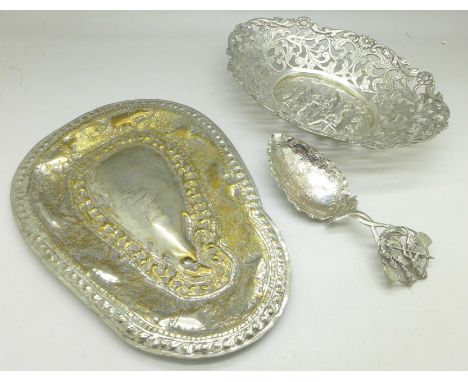 An 833 silver embossed and pierced dish, an 800 silver caddy spoon and a plated tray (3), 198g