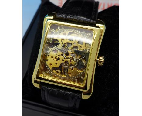 A gentleman's Winner manual wind wristwatch, skeleton dial, in an associated Pendule box