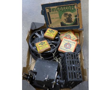 A Bingoscope hand cranked projector model no. 04 with fifteen films