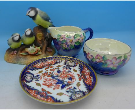 A Maling lustre cream and sugar basin, a Royal Crown Derby figure group of Blue Tits and Chicks by K. Wood, tail a/f and a Ro