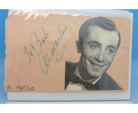 An album of 1950's music autographs, including Al Martino, Guy Mitchell, Ruby Murray, Anne Shelton, Harry Belafonte, etc.