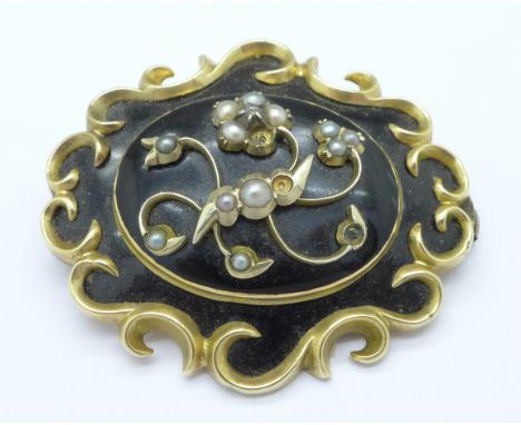 A Victorian yellow metal and pearl mourning brooch, lacking three pearls