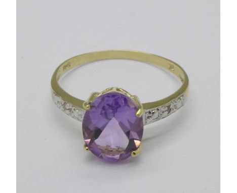 A 9ct gold, amethyst and diamond ring, 1.2g, N