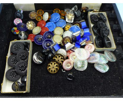 A collection of vintage buttons and buckles including Art Deco