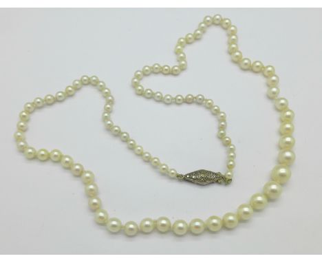 A silver and pearl necklace