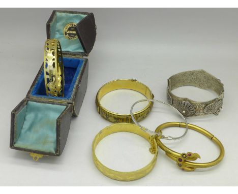 Six vintage bangles including a boxed bangle and one silver and diamond set bangle