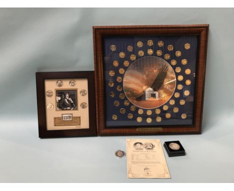 A framed J.F. K. half dollar collection, 50th Anniversary 1960 - 2010, a 2017 Isle of Man Angel coin, a 2013 £5 coin and a fr