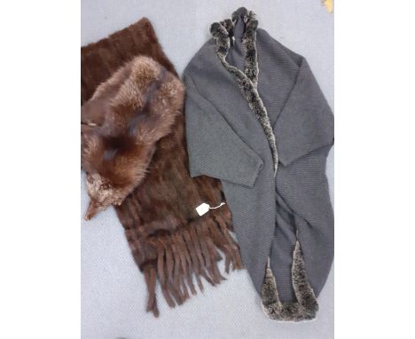 A vintage brown ermine wrap with tail fringe, a wolf stole and a modern woollen and chinchilla long line cardigan by N. Peal,