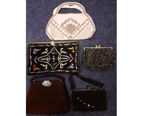 Five vintage evening bags to include a French beaded example and an Oriental inspired embroidered bead bag with ornate cloiso