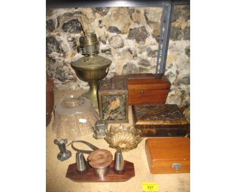 A lot to include a brass oil lamp with etched shade, 19th century sarcophagus shaped mahogany tea caddy, vintage tin, teak an