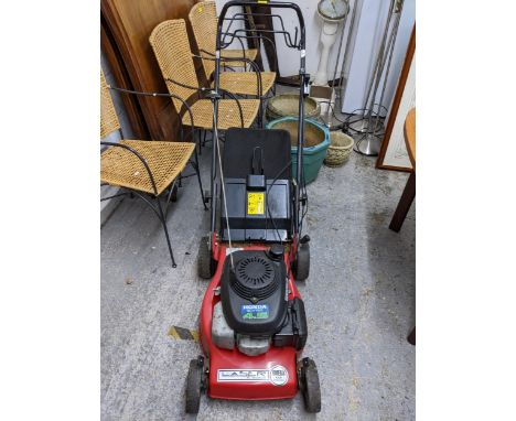 A Laser powered lawnmower with a Honda engine Location: 
