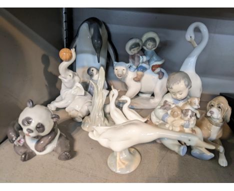 A collection of Lladro ornaments, together with two Nao geese ornaments Location: 