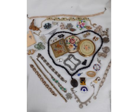 Vintage costume jewellery to include paste brooches, silver filigree brooches and bracelets and faux pearls together with 3 c