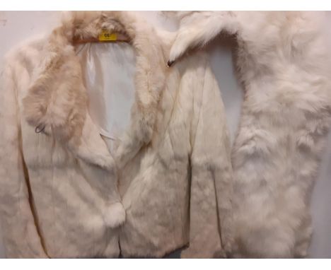 A vintage cream arctic ermine fur lightweight box jacket together with a vintage French white fox stole. Location:Rail 
