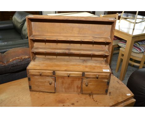 Miniature scale pine dresser with two tier raised back above two drawers and three cupboard doors