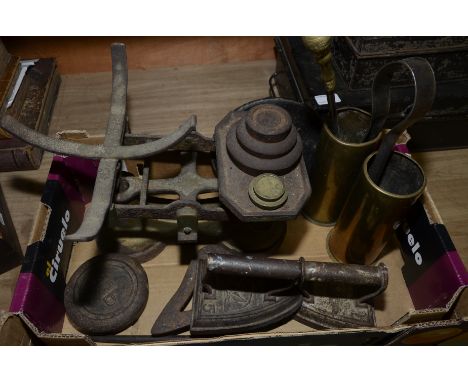 Two flat irons, set of scales, trivets etc.