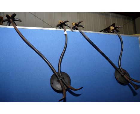 Unusual pair of palm tree effect twin branch wall light fittings