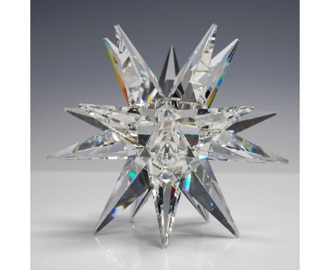 Brilliantly crafted Swarovski Silver Crystal star-shaped candleholder, featuring intricate multi-pointed design that captures