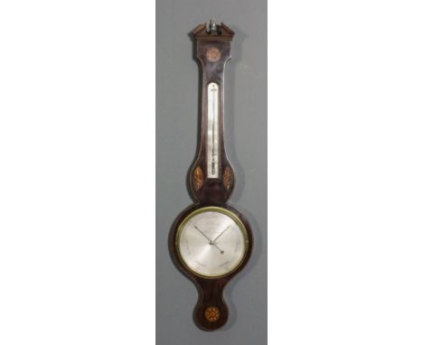 An early 19th Century mahogany cased wheel barometer and thermometer by F. Pastorelli, Cross Street, Hatton Garden, the 8ins 