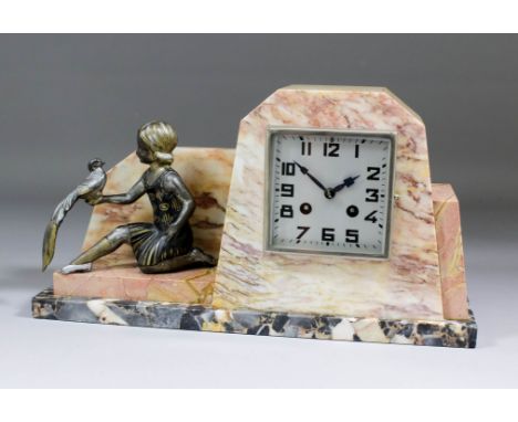 An early 20th Century French red veined marble cased mantel clock of Art Deco design with 4ins square silvered dial with Arab