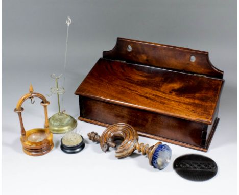 An 18th Century walnut candle box, 14.5ins x 6.75ins x 8.25ins, a table pincushion with turned wood clamp, 9ins high, an ebon