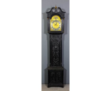 A 19th Century "Black Oak" longcase clock by John Bagshaw of Liverpool, the 12ins arched brass dial with silver chaptering, g