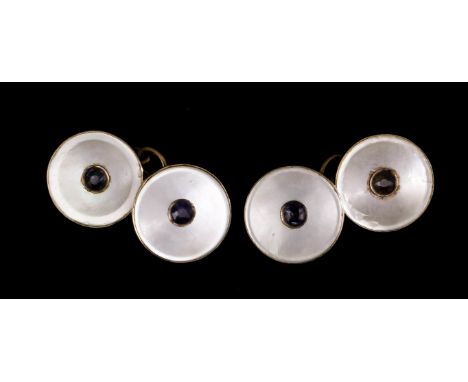 A pair of late 19th Century gentleman's gold coloured metal mounted mother of pearl and sapphire set cufflinks, the 15mm diam