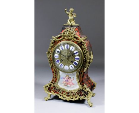 A late 19th Century French tortoise-shell and Boulle mantel clock of Louis XV design by S. Marti and Cie, No. 52368 and retai