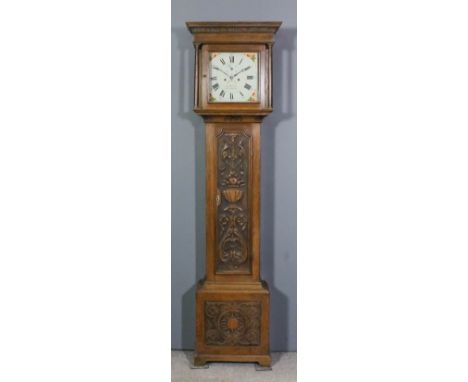 An oak longcase clock by Jas. Warren of Canterbury, the 12ins square painted dial with Roman and Arabic numerals, subsidiary 