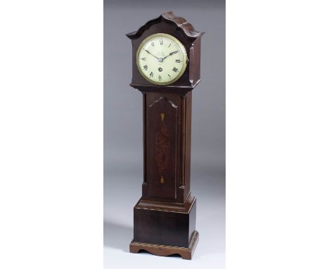 An early 20th Century mahogany cased miniature longcase clock timepiece, the 4ins diameter cream enamelled dial with Roman nu