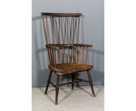 A late 18th/ early 19th Century West country ash and elm two tier stick back Windsor armchair with plain crest rail and arms,