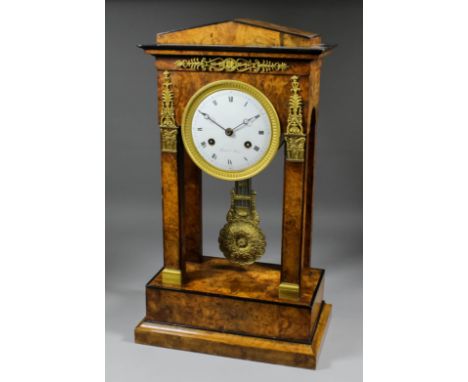 A 19th Century French pollard oak and ebonised "Portico" style mantel clock, the 5.25ins diameter white enamelled dial signed