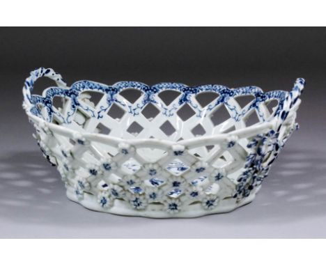 An 18th Century Worcester blue and white porcelain two handled oval chestnut basket, printed with the "Pinecone" pattern (pri