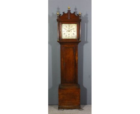 A late 18th Century oak longcase clock by James Warren of Canterbury, the 12ins square silvered dial with Roman and Arabic nu