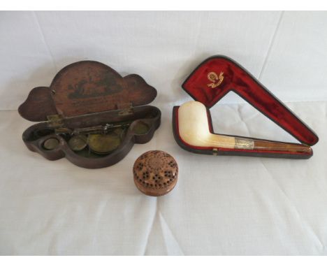 Silver banded amber and bone tobacco pipe in leather case, carved wooden pomander , pocket scales & dram weights, Samuel Gatc