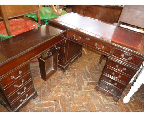 Mahogany leather inset pedestal desk with corner return 