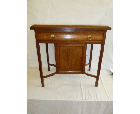 Early 20thC light oak parquetry top ladies work table with fitted cupboard and drawer 