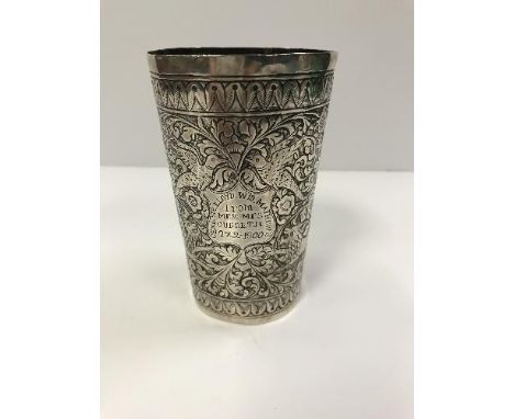 An Indian silver goblet engraved "Genl. Sir Lloyd WM. Matthews from Mr &amp; Mrs Cursetji 27-2-1900", decorated with beasts a